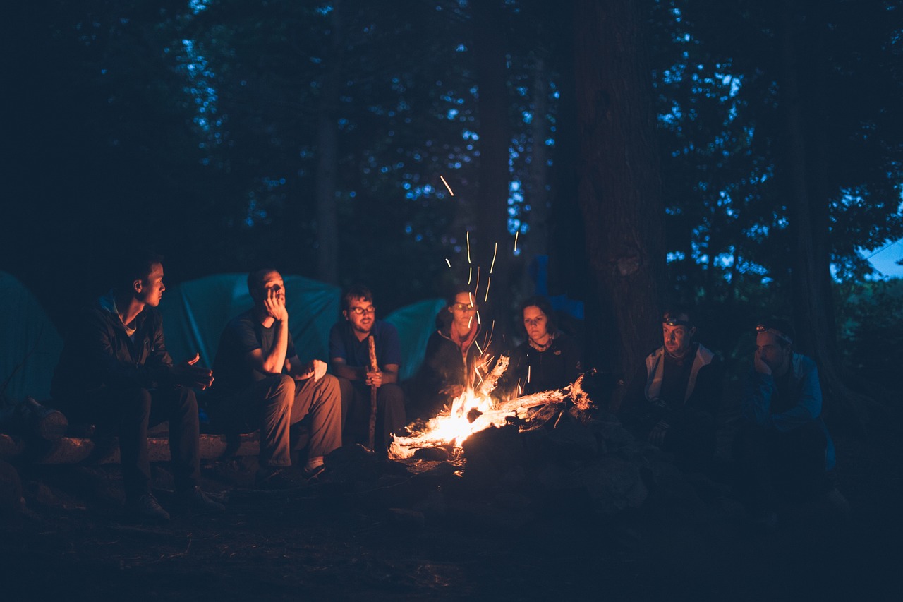 Staff Retreat Idea from Exploring Emirates - Camp Retreat - The Exploring Emirates team around a campfire